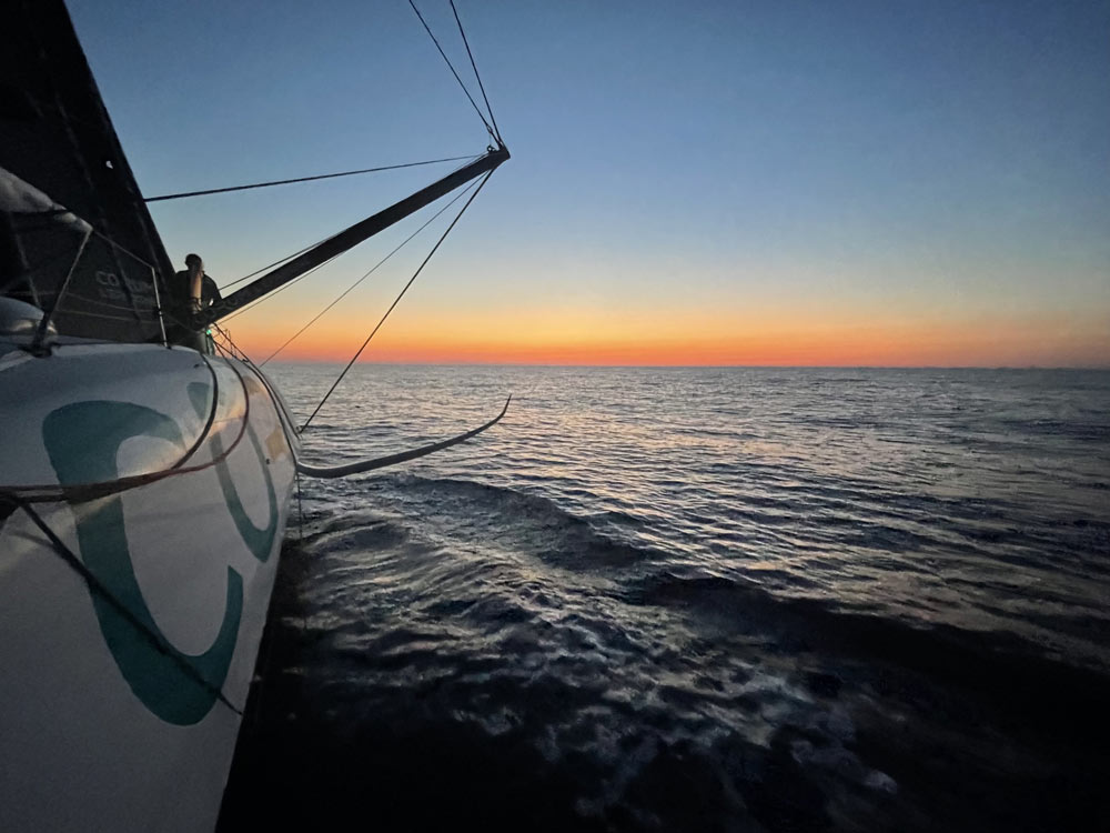 Couché de soleil mer bateau CORUM