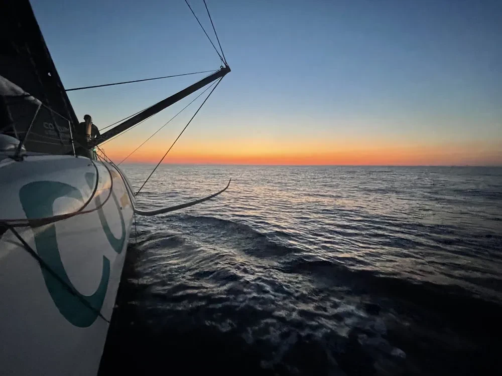 Couché de soleil mer bateau CORUM